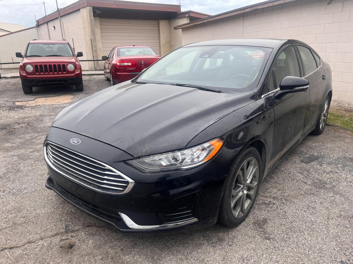 2020 BLACK Ford Fusion SEL (3FA6P0CD5LR) with an 1.5L L4 DOHC 16V engine, 6A transmission, located at 8101 E. Skelly Dr., Tulsa, OK, 74129, (918) 592-3593, 36.121891, -95.888802 - Photo#0